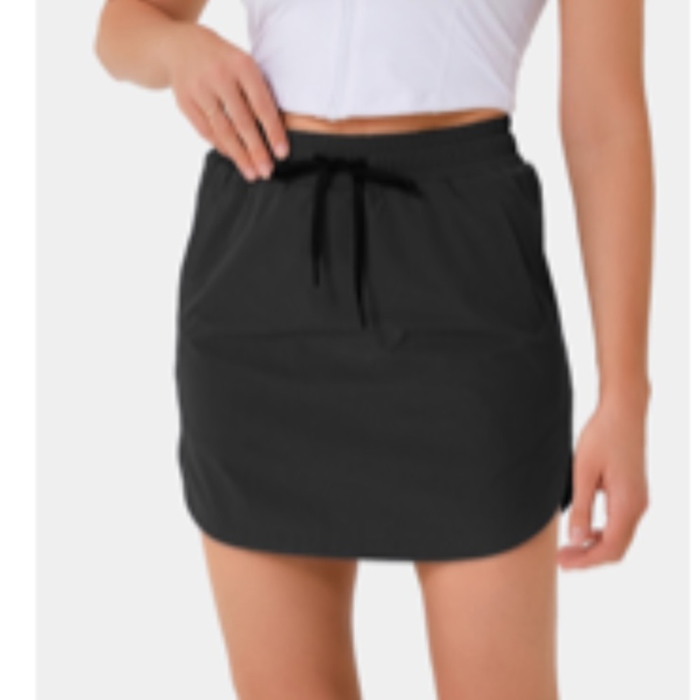 Black Halara golf skirt. Size small. Never worn before.